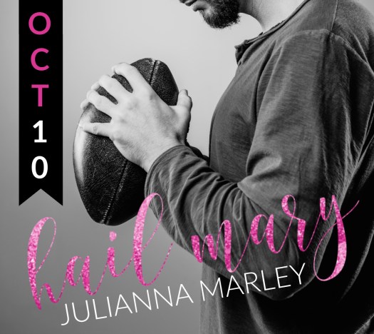 Young attractive football player with ball on gray background